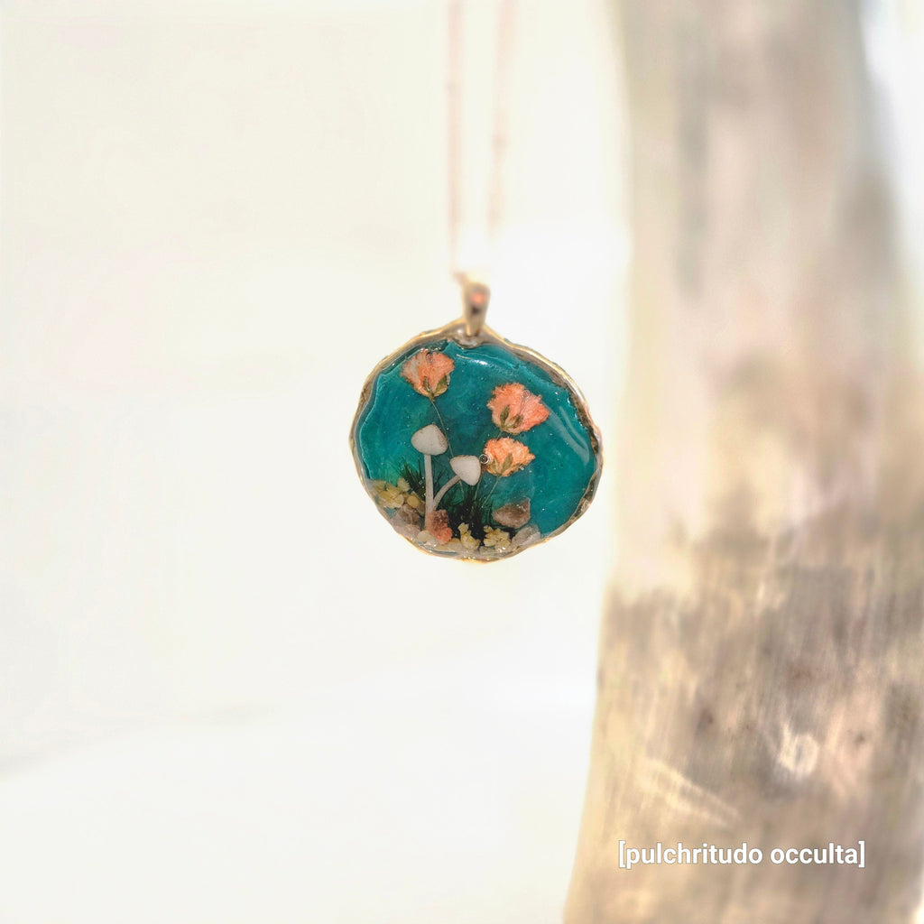 Necklace with a floral pendant on a light background