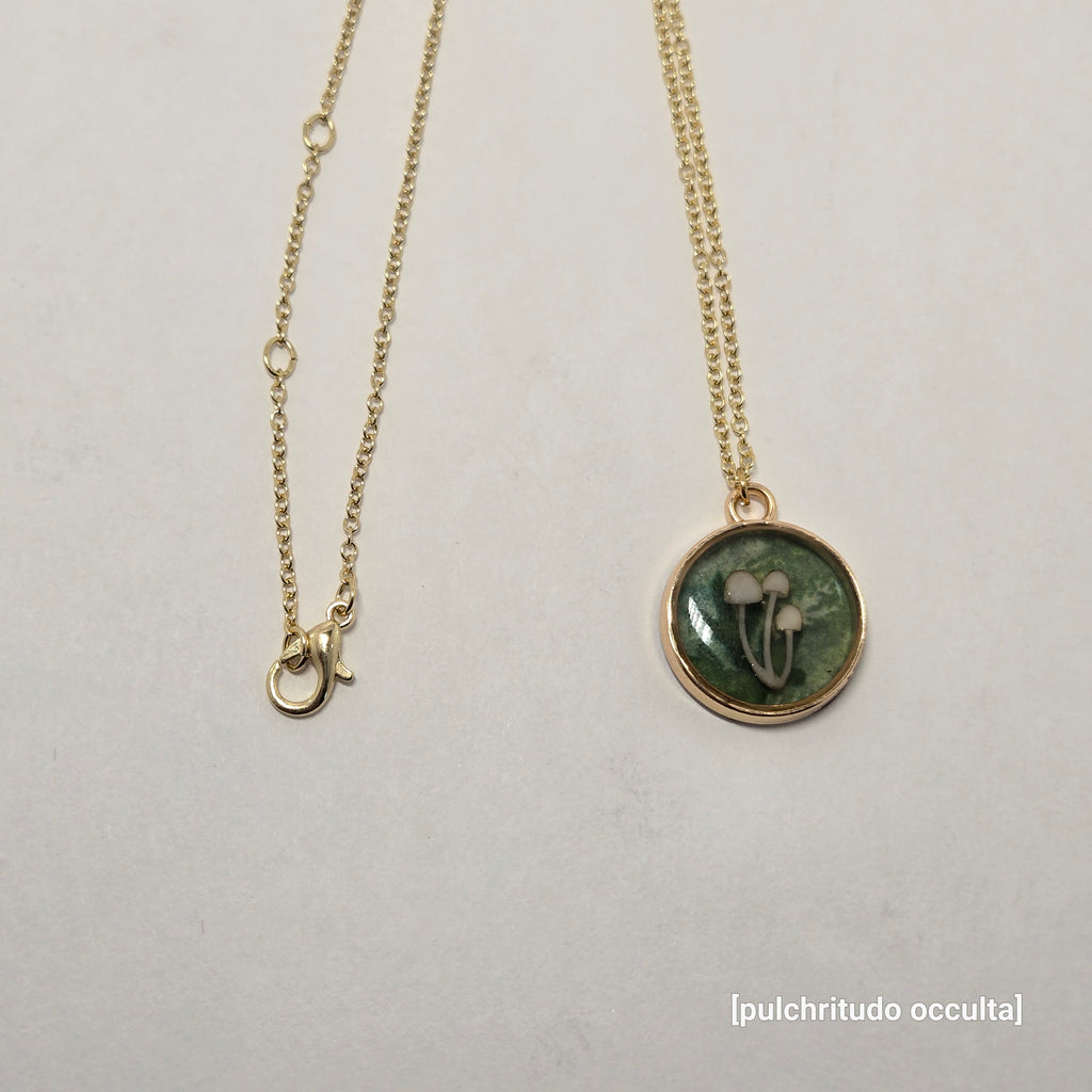 Necklace with a circular pendant on a light gray background