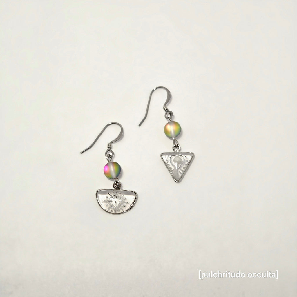 Pair of silver earrings with colorful beads on a light gray background