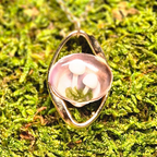 The Turning Shell Pendant
