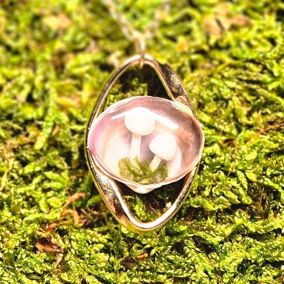 The Turning Shell Pendant