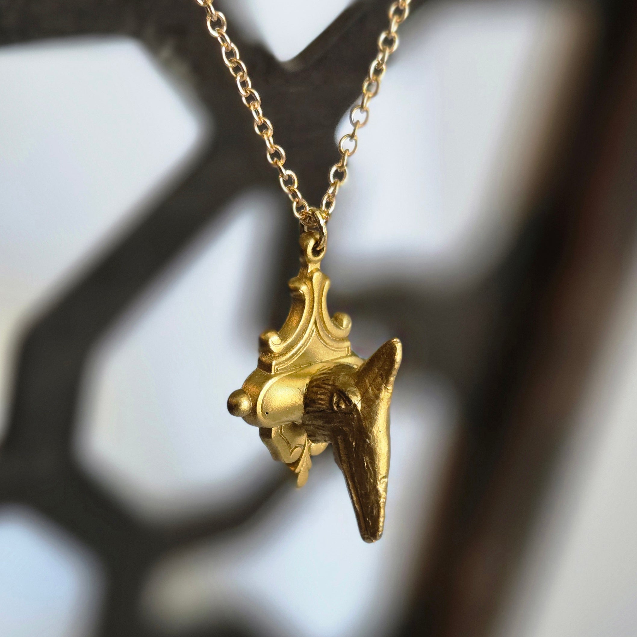 one of a kind gold tone winged pterosaur trophy necklace on ornate plaque pendant handmade