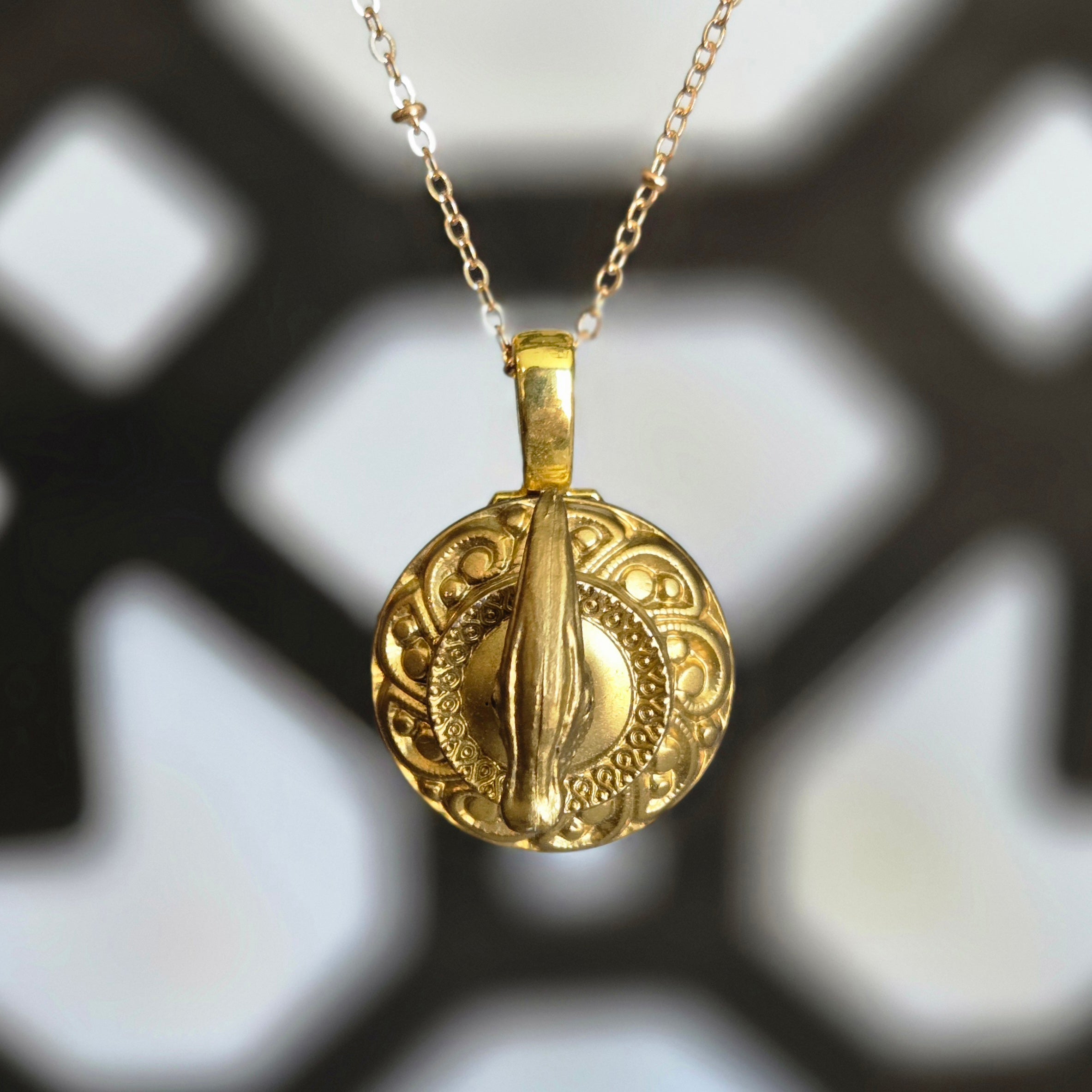 one of a kind gold tone parasaurolophus trophy necklace on ornate plaque pendant handmade