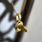 one of a kind gold tone raptor head trophy necklace on ornate plaque pendant handmade