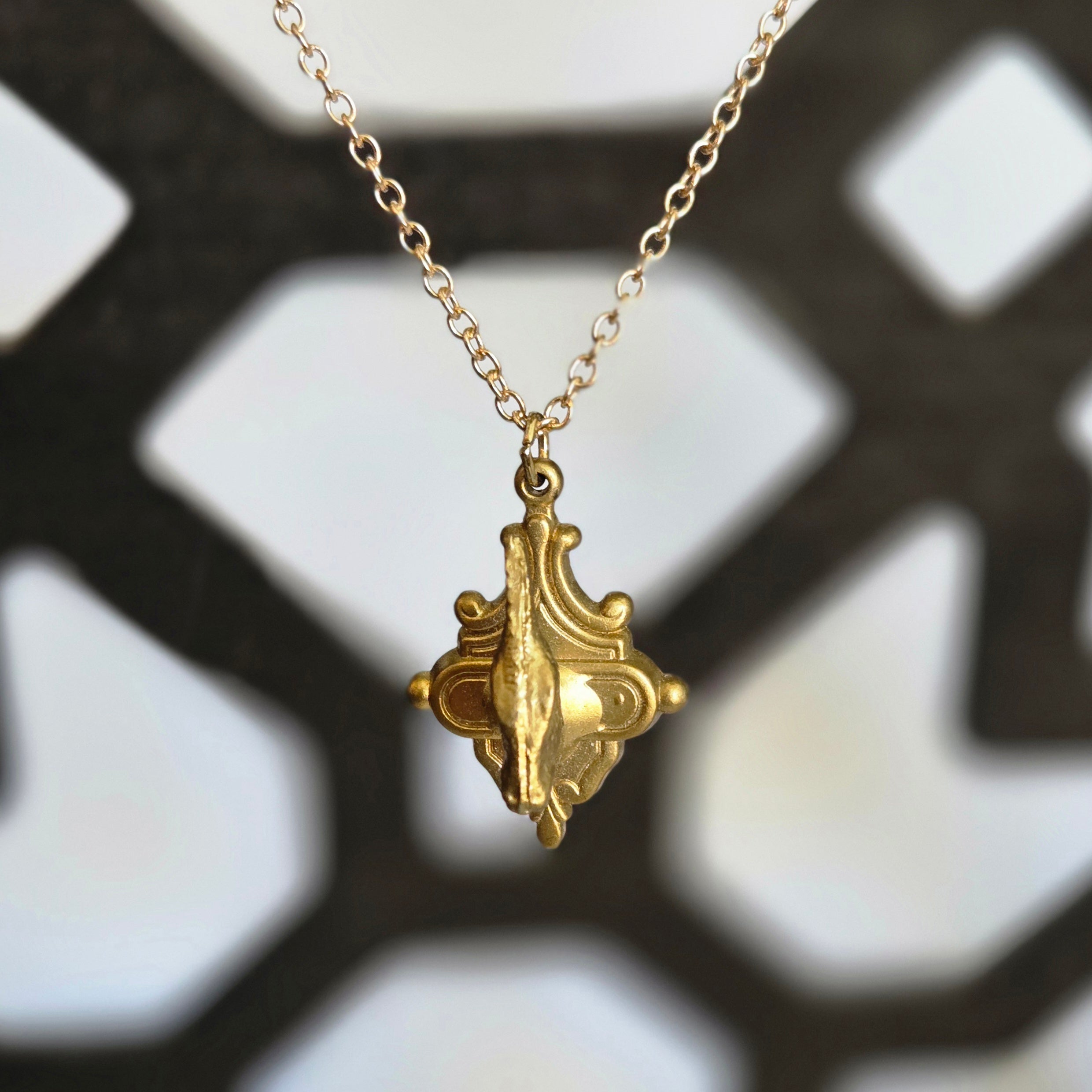 one of a kind gold tone parasaurolophus II trophy necklace on ornate plaque pendant handmade