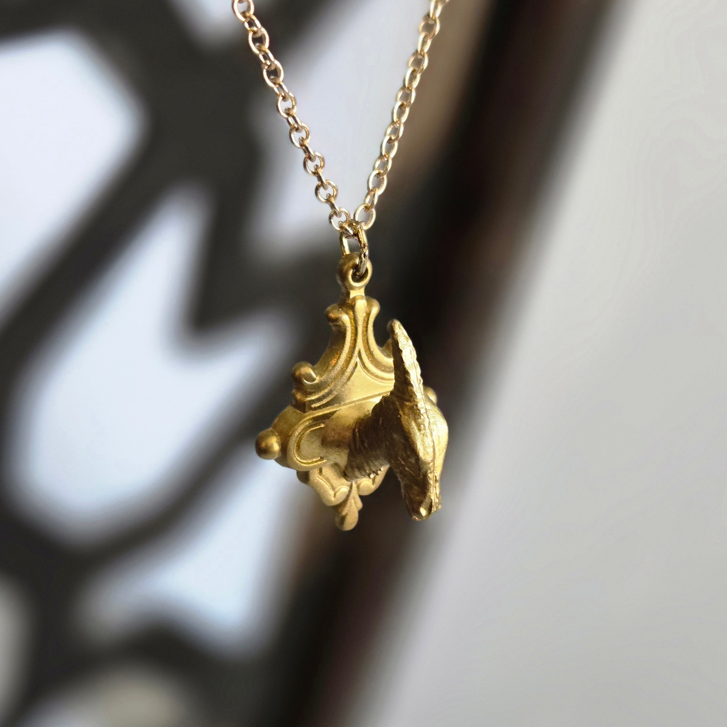 one of a kind gold tone parasaurolophus II trophy necklace on ornate plaque pendant handmade