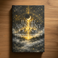 Book titled 'Lunar Alignment Journal' on a wooden surface Beauty Undiscovered 