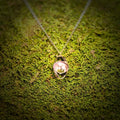 The Turning Shell Pendant