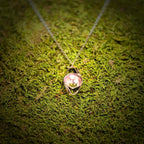 The Turning Shell Pendant