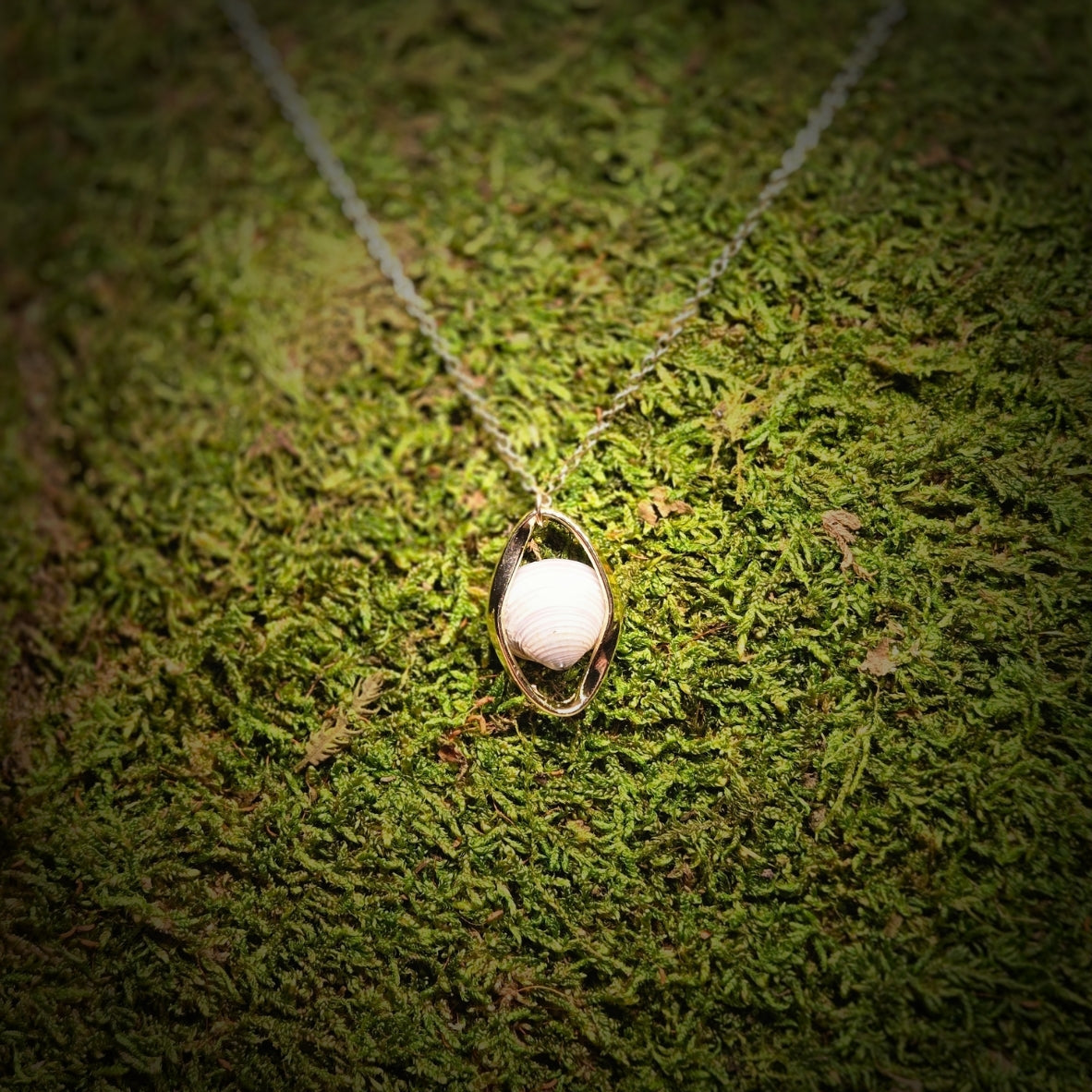 The Turning Shell Pendant