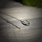 The Turning Shell Pendant